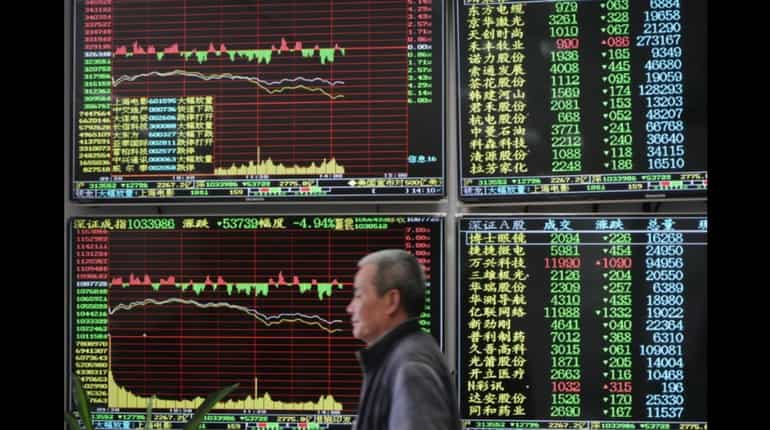 Global stocks slide, yen jumps, as trade war fears grip markets