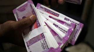 Rupee rises 10 paise against dollar in opening trade
