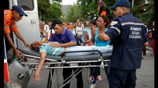 Venezuela arrests five police officials over deadly jail disaster