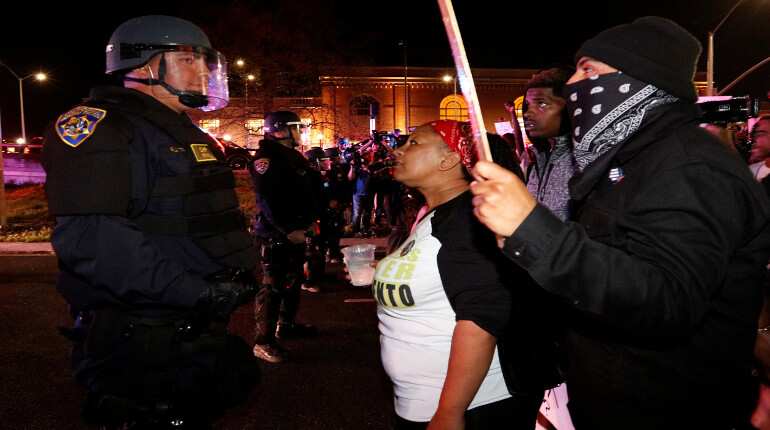 Autopsy prompts more protests over killing of black man in California