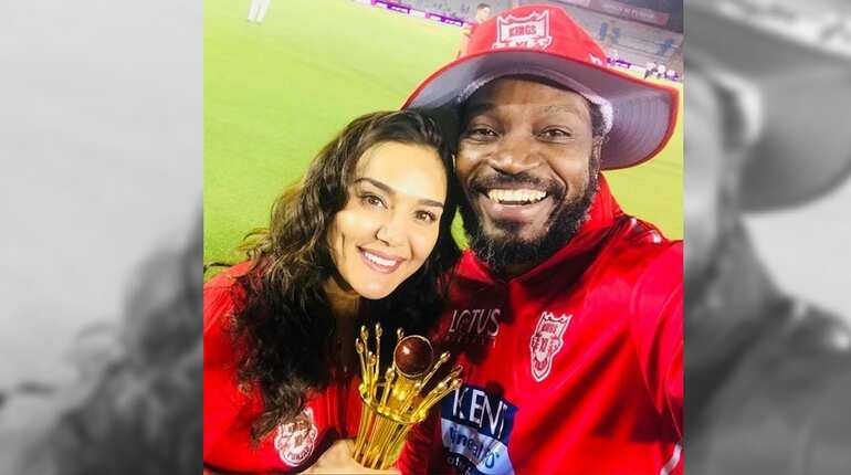 Preity Zinta with Chris Gayle after winning the match