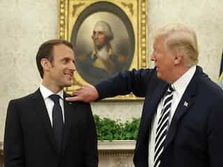 Watch: Trump brushes 'dandruff' off Macron, wants to make him 'perfect'