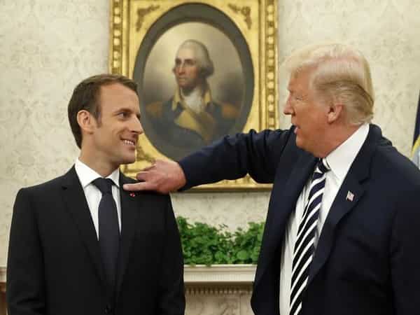 Watch: Trump brushes 'dandruff' off Macron, wants to make him 'perfect'