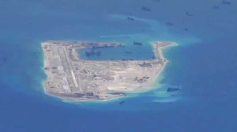 Chinese bombers make debut landing on disputed South China Sea runway