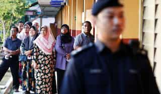 Malaysian politicians claim tech sabotage as polling begins