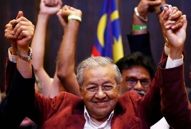 Malaysia's Mahathir Mohamad to be sworn-in as PM after historic poll win