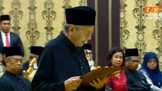 Malaysia's Mahathir sworn in as world's oldest leader after shock poll win