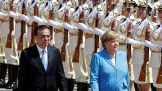 Merkel woos China as Trump poses new trade challenge