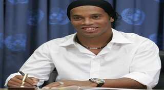 Oak tree sits in middle of soccer pitch, what would Ronaldinho do?