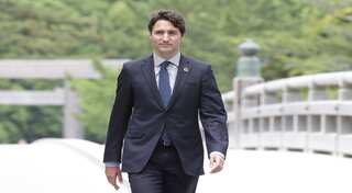 Canada PM pushes work-life balance, cabinet too busy to listen