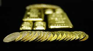 Gold falls from two-year high as Brexit campaign suspended