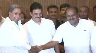 Congress-JD(S) to fight 2019 Lok Sabha polls together, announce cabinet portfolios in Karnataka