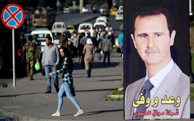 Syria's Assad says will visit North Korea, news agency reports