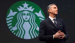 Starbucks faces internal conflict as Howard Schultz opposes Elliott settlement