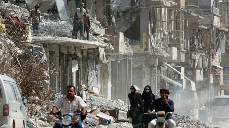 Evidence shows coalition attacks on Syria's Raqqa broke law: Amnesty
