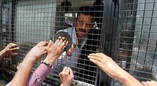 14 years after Gujarat massacre, Indian court jails 11 for life