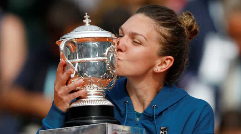 Tennis: Simona Halep shrugs off Stephens challenge to win French Open title