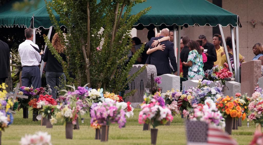 Tension at funeral for Orlando victims as driver injures two officers and members of anti-gay church protest