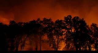 Southern California wildfire spreads as blazes hit parched states