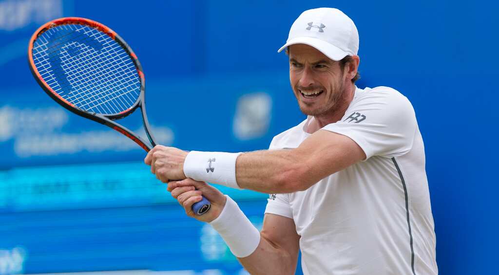 Murray downs Raonic to win record fifth Queen's title
