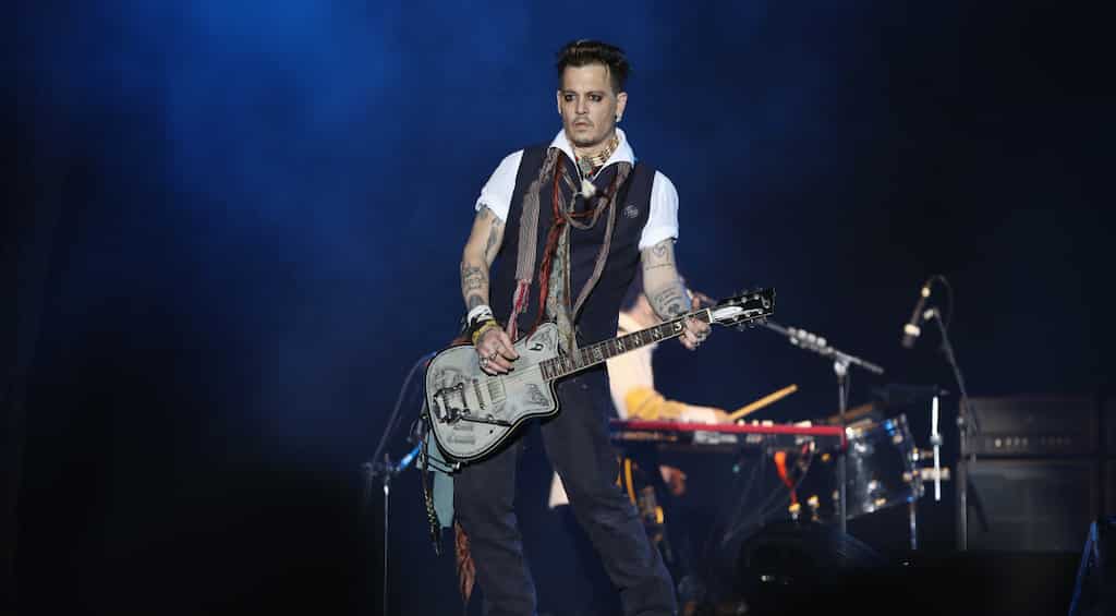 Johnny Depp loosens up with belly dancers amid divorce drama, he probably needed it