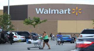 Wal-Mart to sell its China e-biz to JD.com for 5% stake