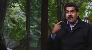 Thousands of Venezuelans petition to drive out president after deadly looting and protests