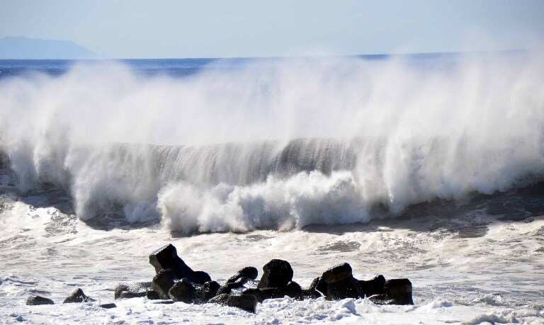 Typhoon Cimaron barrels towards flood-hit western Japan