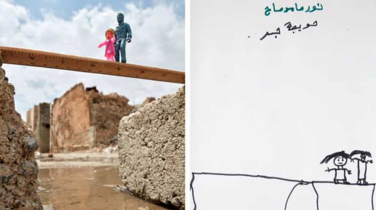 An Iraqi child and his father fleeing