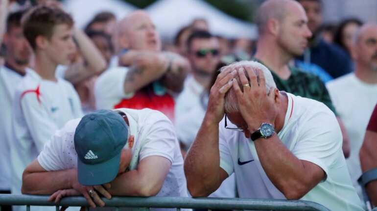 Disappointed fans after the match