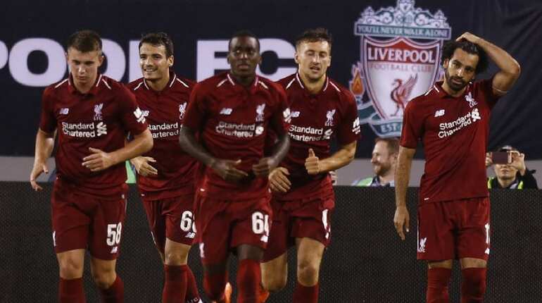 Liverpool pay tribute to young fan killed by lightning strike
