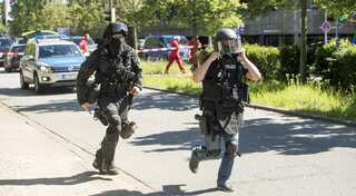 Armed man breaks into German cinema, shot dead, no patrons hurt
