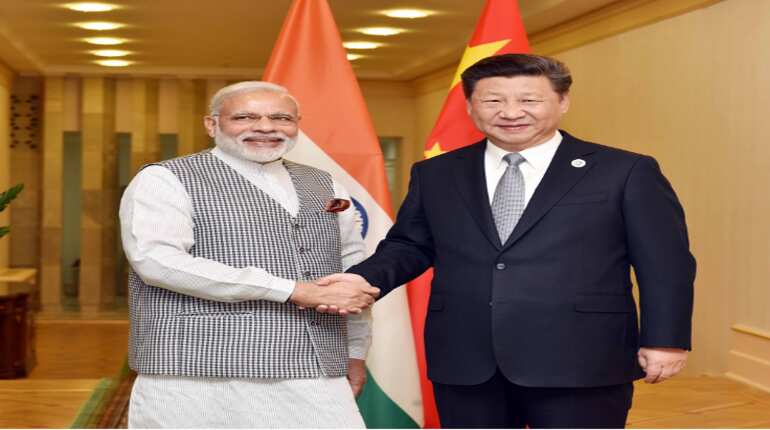 Modi meets Jinping, urges China to fairly asses India's NSG bid