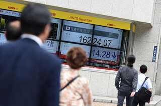 Asian markets mostly up ahead of key meetings in China and US
