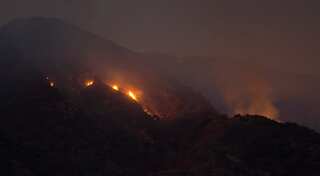Firefighters injured, dozens of homes destroyed in California wildfire