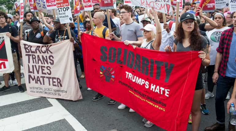 Racism haunts America as African-Americans struggle for equality Racism haunts America as African-Americans struggle for equality