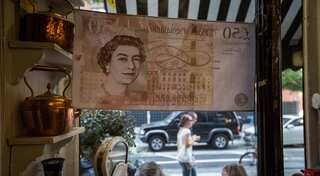Britain's credit rating outlook cut to 'negative'