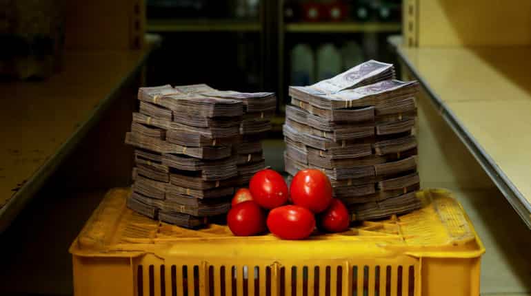Venezuela slashes five zeros from currency as economic plan sows confusion