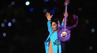 Prince's guitar, Bowie's hair sold for more than $150k