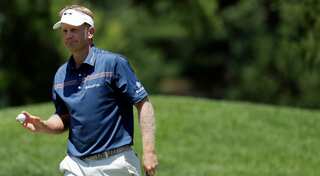 Golfer Hurley moves two ahead at Congressional, Els lurks
