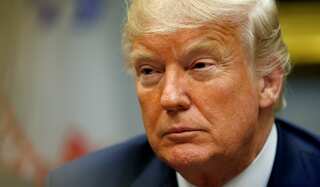 Obama's former photographer trolls Donald Trump over his 'wall' demand
