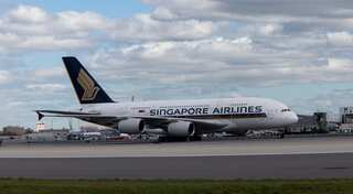 Singapore Airlines plane catches fire after making emergency landing at Changi