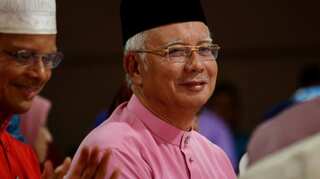 Malaysia PM Najib Razak reshuffles cabinet to strengthen coalition