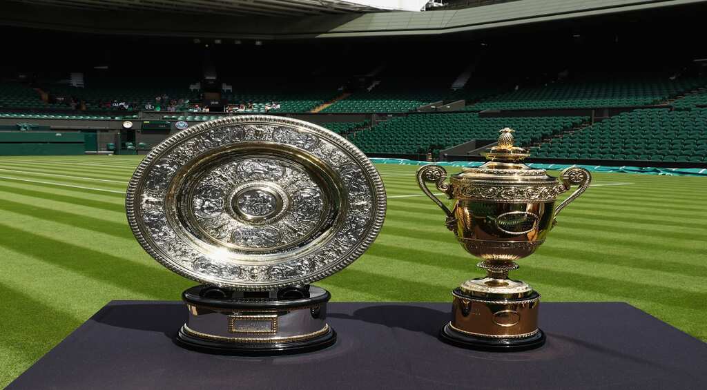 History on line as Djokovic, Federer get Wimbledon under way