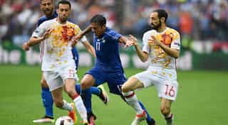 Italy leave defending behind, put two past Spain