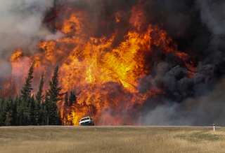 Trepidation lingers as Canada wildfire evacuees begin to return home
