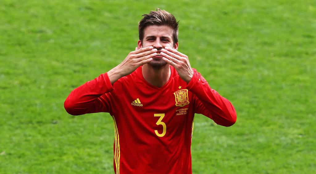 Defending champs Spain seal last-gasp win
