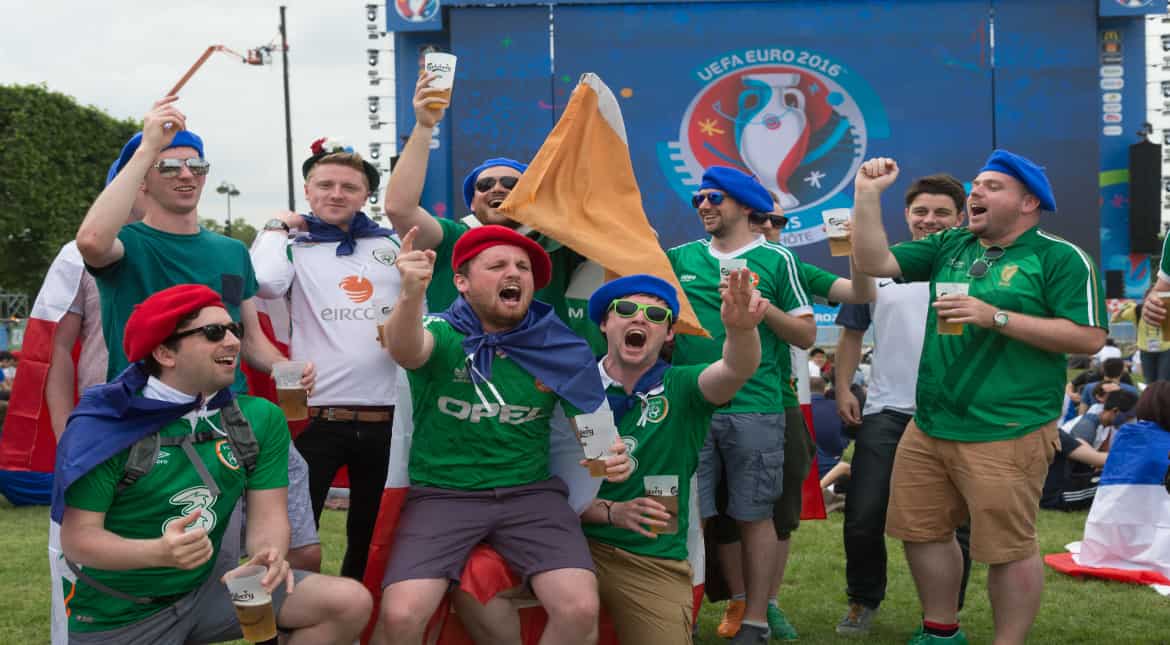 Fans gather at the UEFA EURO Fan Zone near the Eiffel Tower, June 10, 2016 in Paris, France. The UEFA EURO 2016 kicks off on June 10 with the first match between Romania and France. (Photo by Thierry