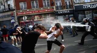 UEFA "regrets" overnight soccer violence ahead of England-Wales match