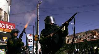 At least 50 arrested and dozens injured as clashes erupt at start of 72-hour strike in Bolivia